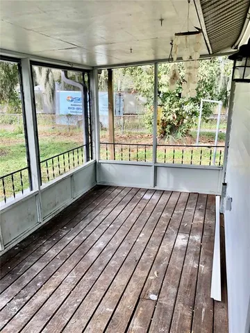 a view of a back yard from a balcony