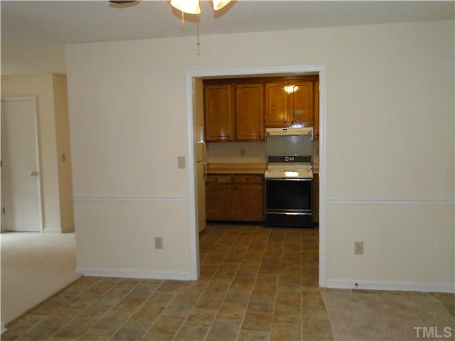 10703 Quail Roost Road Bahama, NC 27503 - Photo 13 of 20 Dining/Kitchen Separation