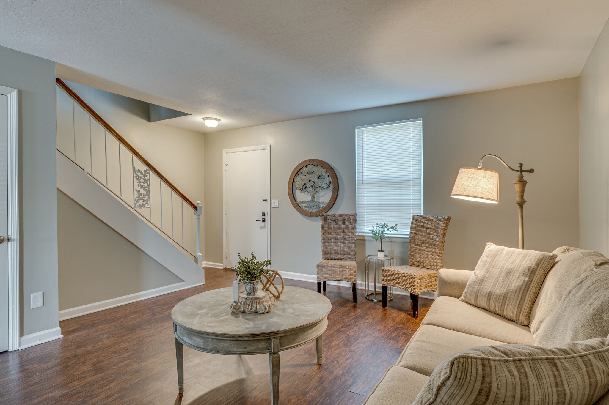 1301 Neelys Bend Road, Unit 90 Madison, TN 37115 - Photo 2 of 17 a living room with furniture and a clock
