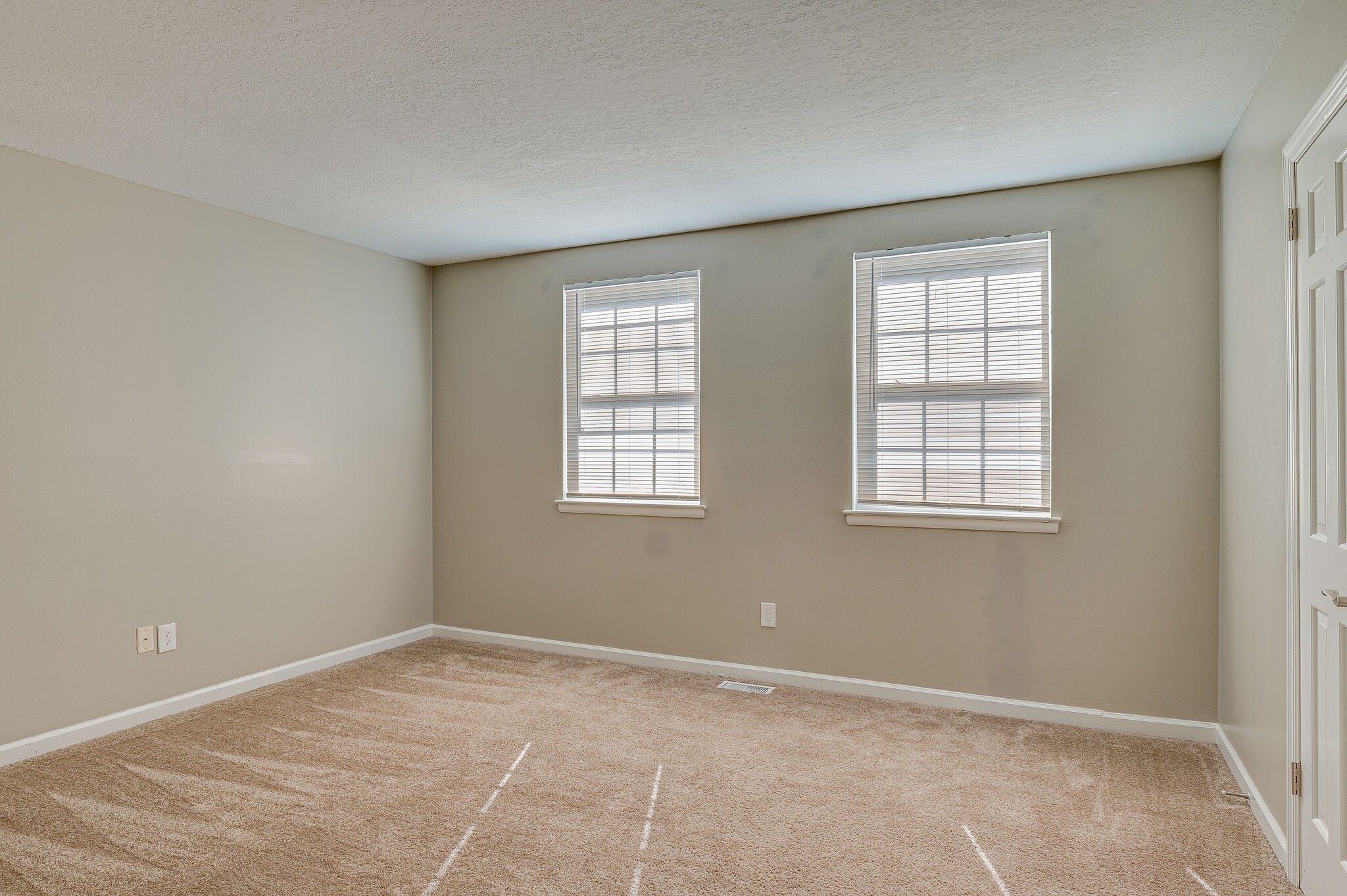 1301 Neelys Bend Road, Unit 90 Madison, TN 37115 - Photo 11 of 17 an empty room with windows