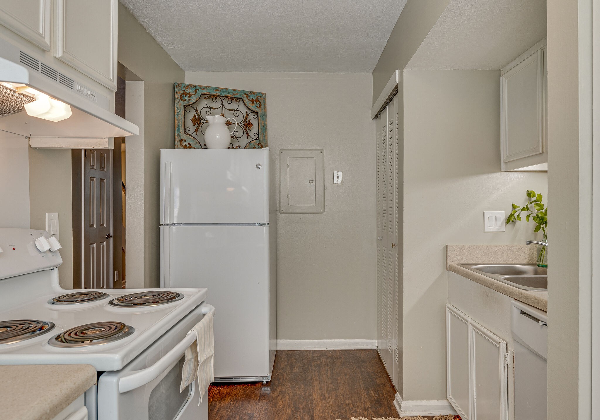 1301 Neelys Bend Road, Unit 90 Madison, TN 37115 - Photo 6 of 17 a kitchen with a refrigerator and a stove top oven