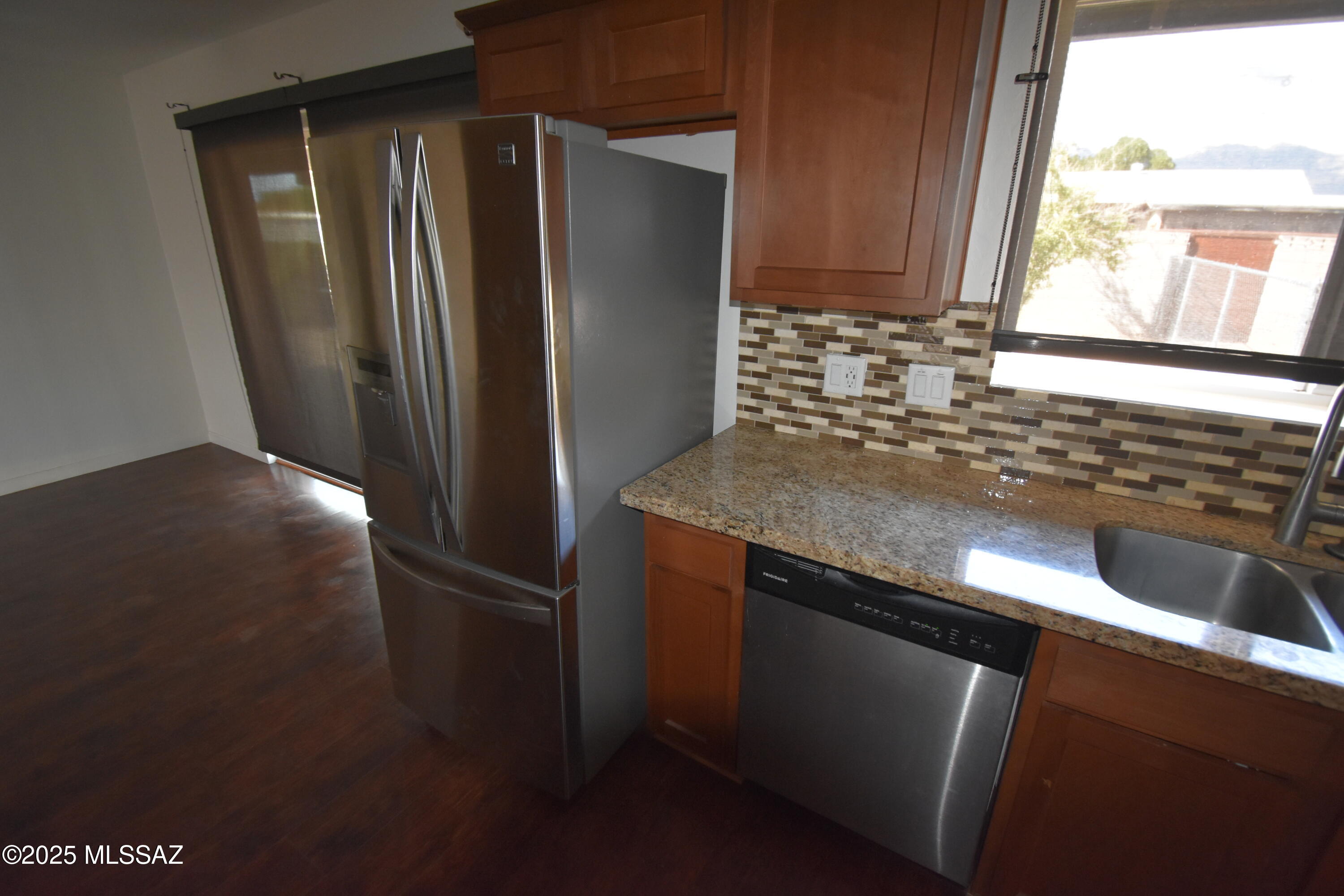 5501 East Spring Street Tucson, AZ 85712 - Photo 19 of 32 a view of a refrigerator a sink and dishwasher