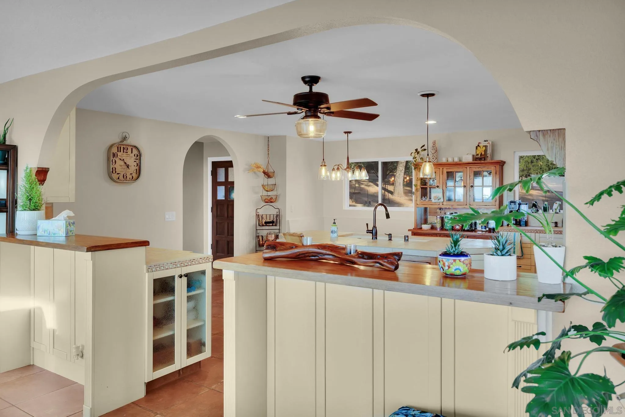 1634 Oakforest Road Santa Ysabel, CA 92070 - Photo 11 of 61 a dining room with kitchen island furniture and a chandelier