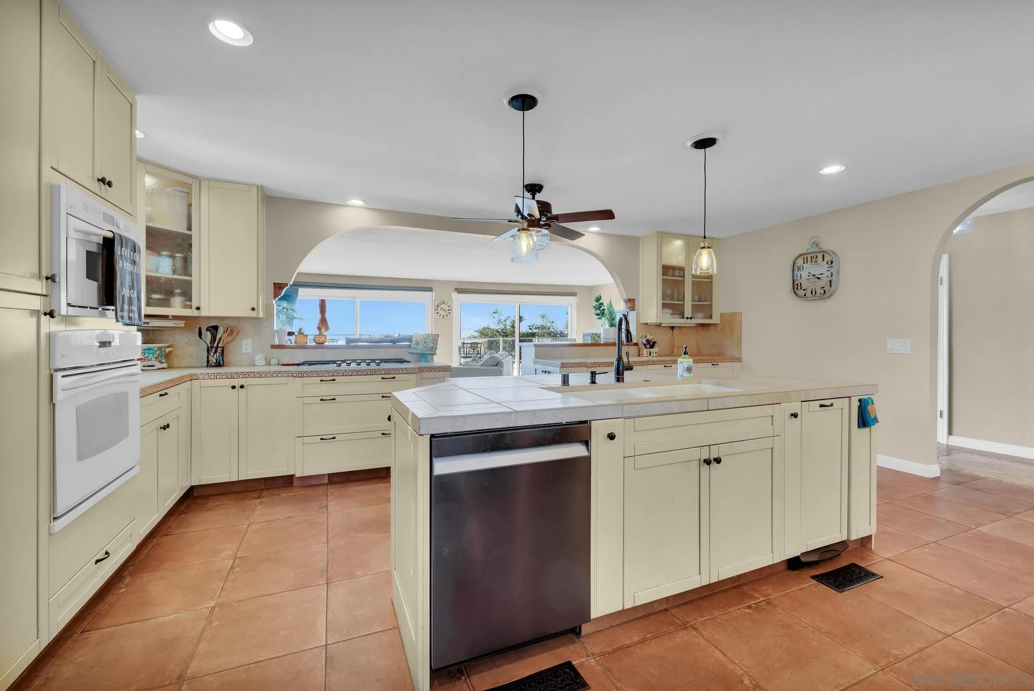 1634 Oakforest Road Santa Ysabel, CA 92070 - Photo 16 of 61 a kitchen with cabinets and sink