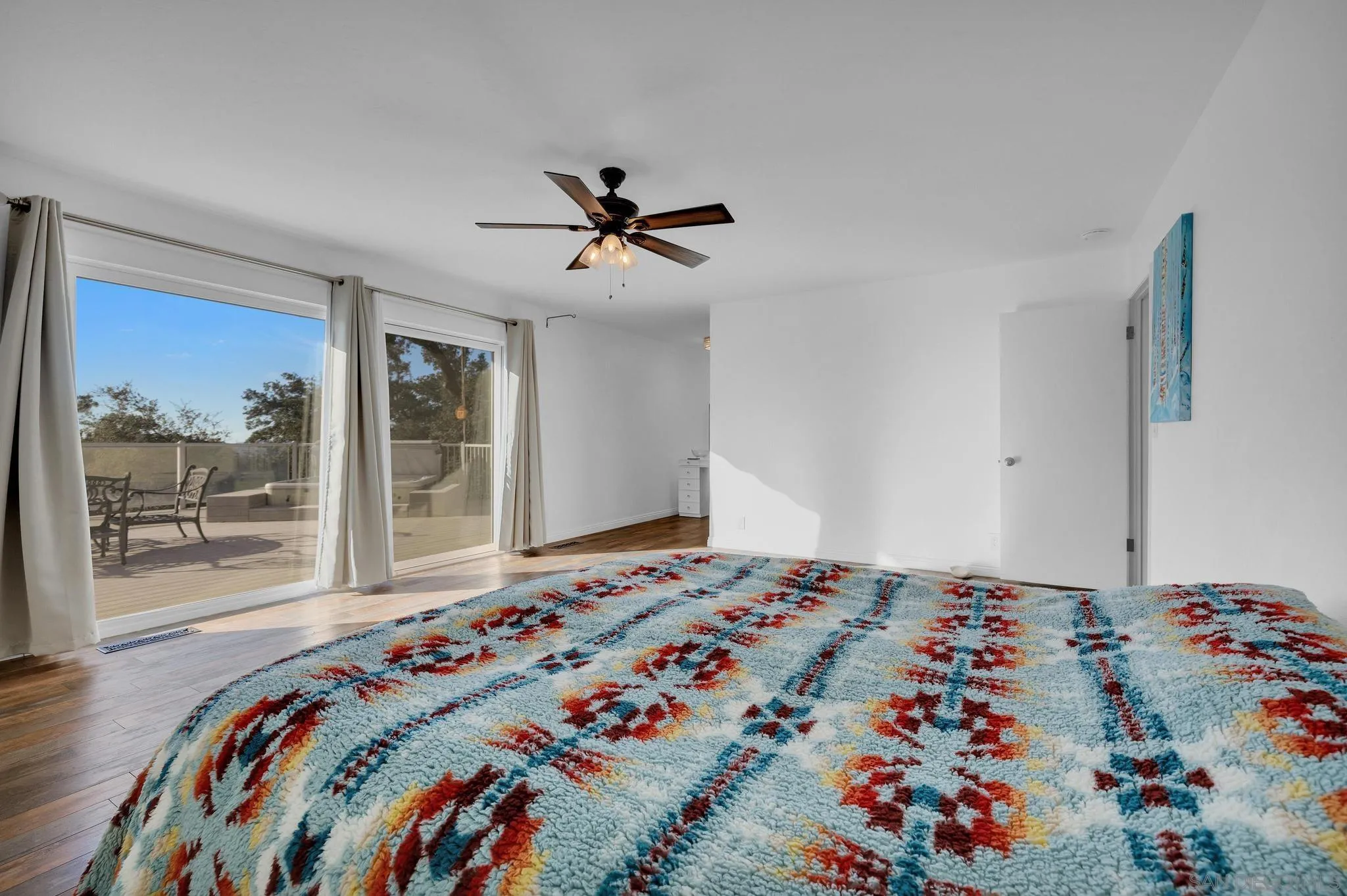 1634 Oakforest Road Santa Ysabel, CA 92070 - Photo 23 of 61 a bedroom with bed and wooden floor