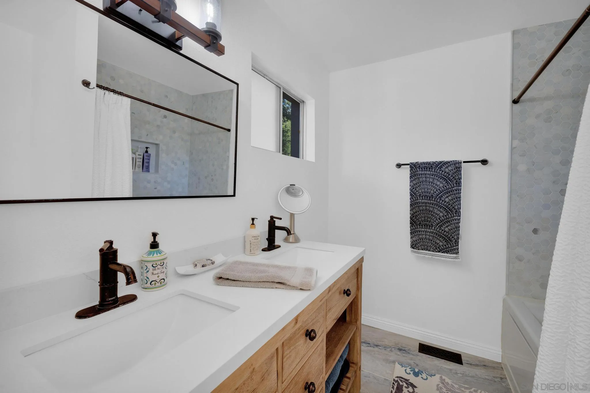 1634 Oakforest Road Santa Ysabel, CA 92070 - Photo 27 of 61 a bathroom with a sink and a mirror