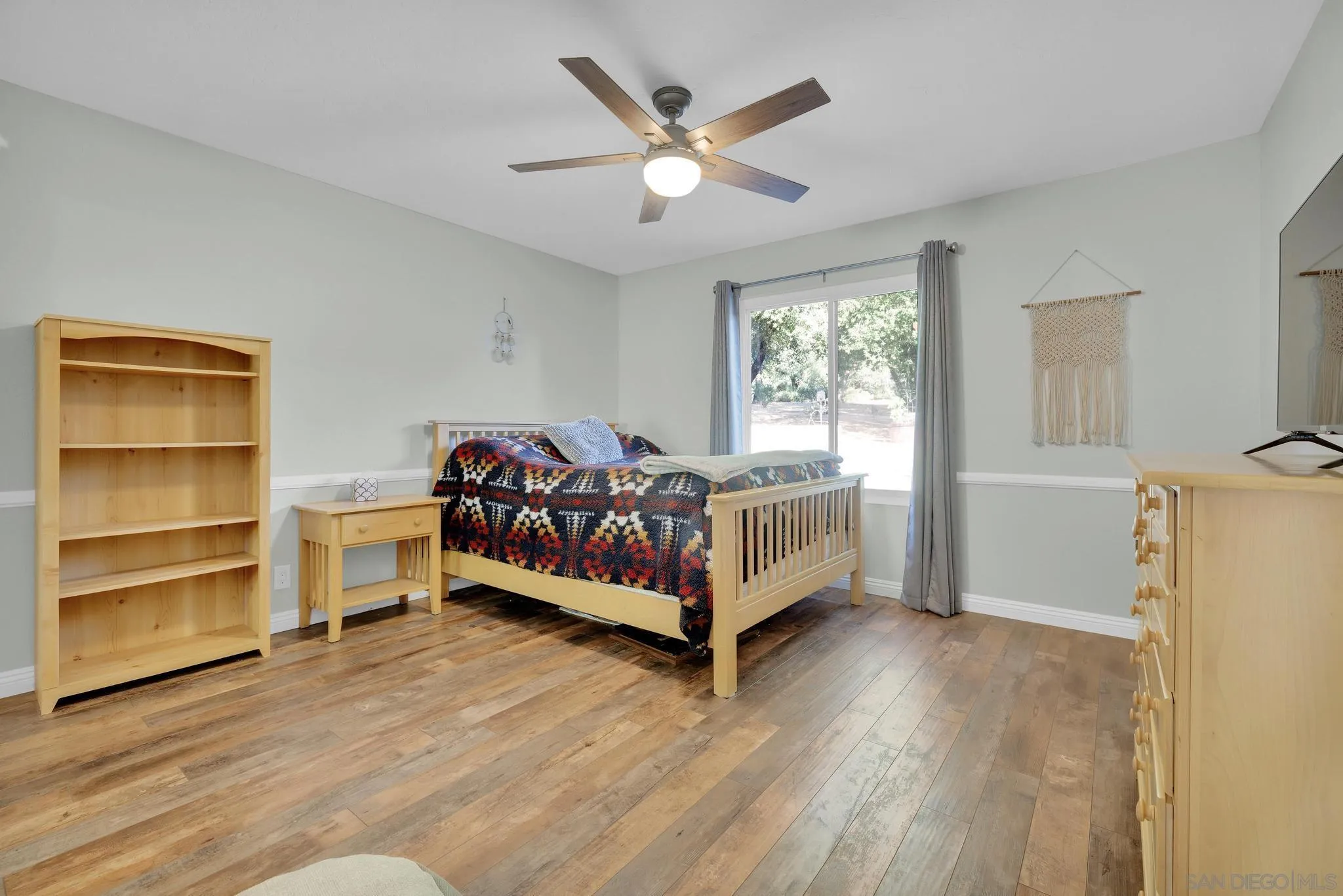 1634 Oakforest Road Santa Ysabel, CA 92070 - Photo 29 of 61 a bed room with a bed and a window
