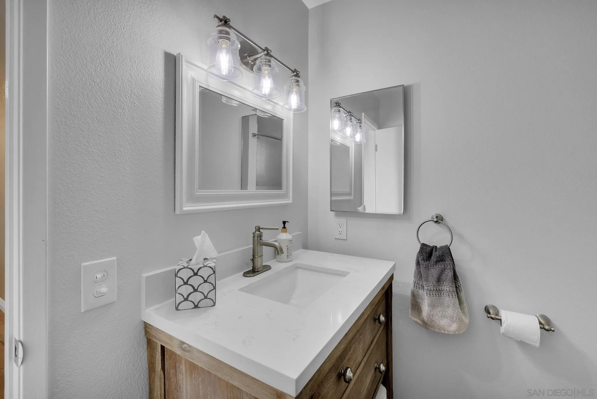 1634 Oakforest Road Santa Ysabel, CA 92070 - Photo 32 of 61 a bathroom with a sink vanity and mirror