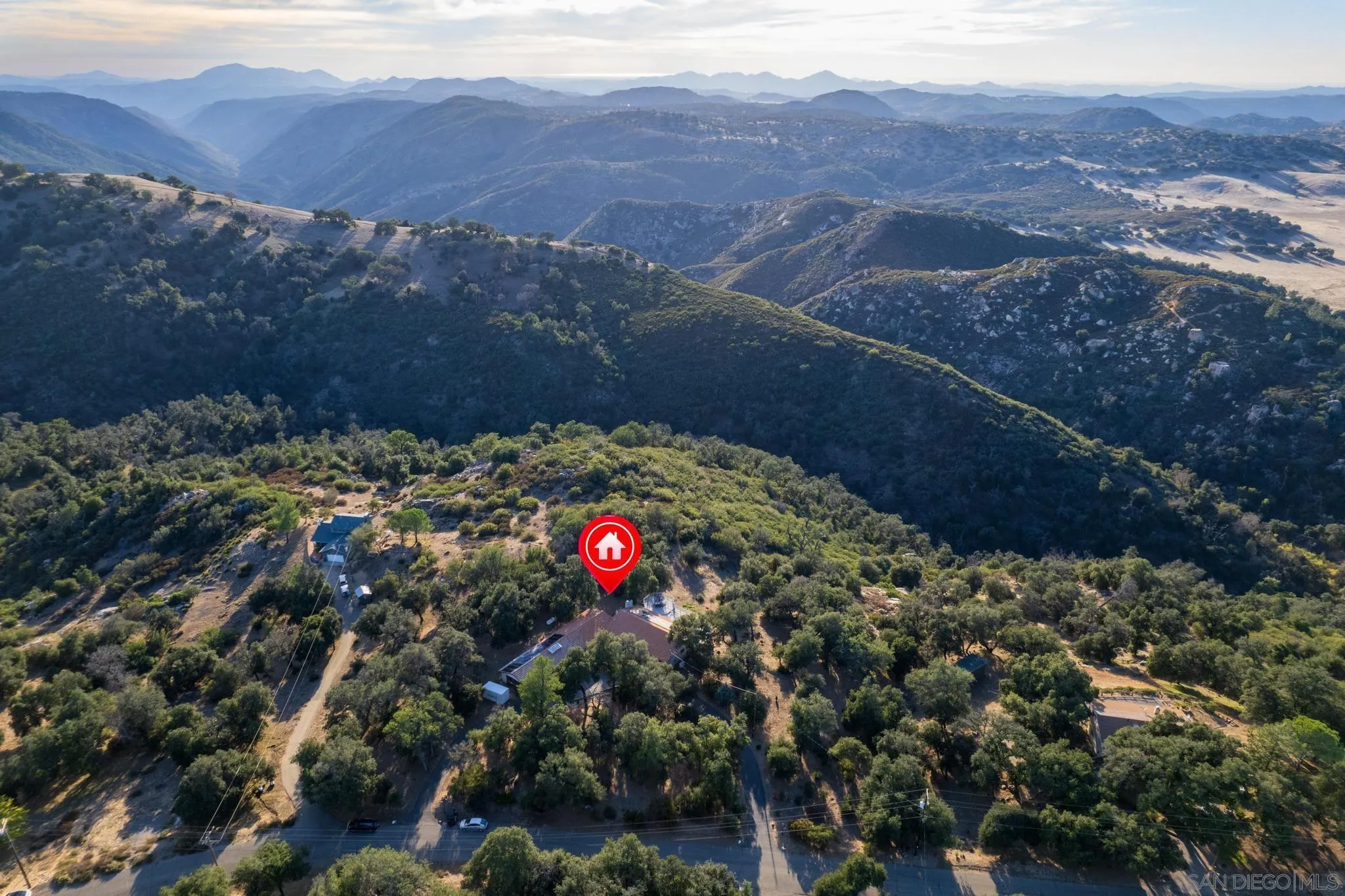 1634 Oakforest Road Santa Ysabel, CA 92070 - Photo 38 of 61 a view of a house with a street