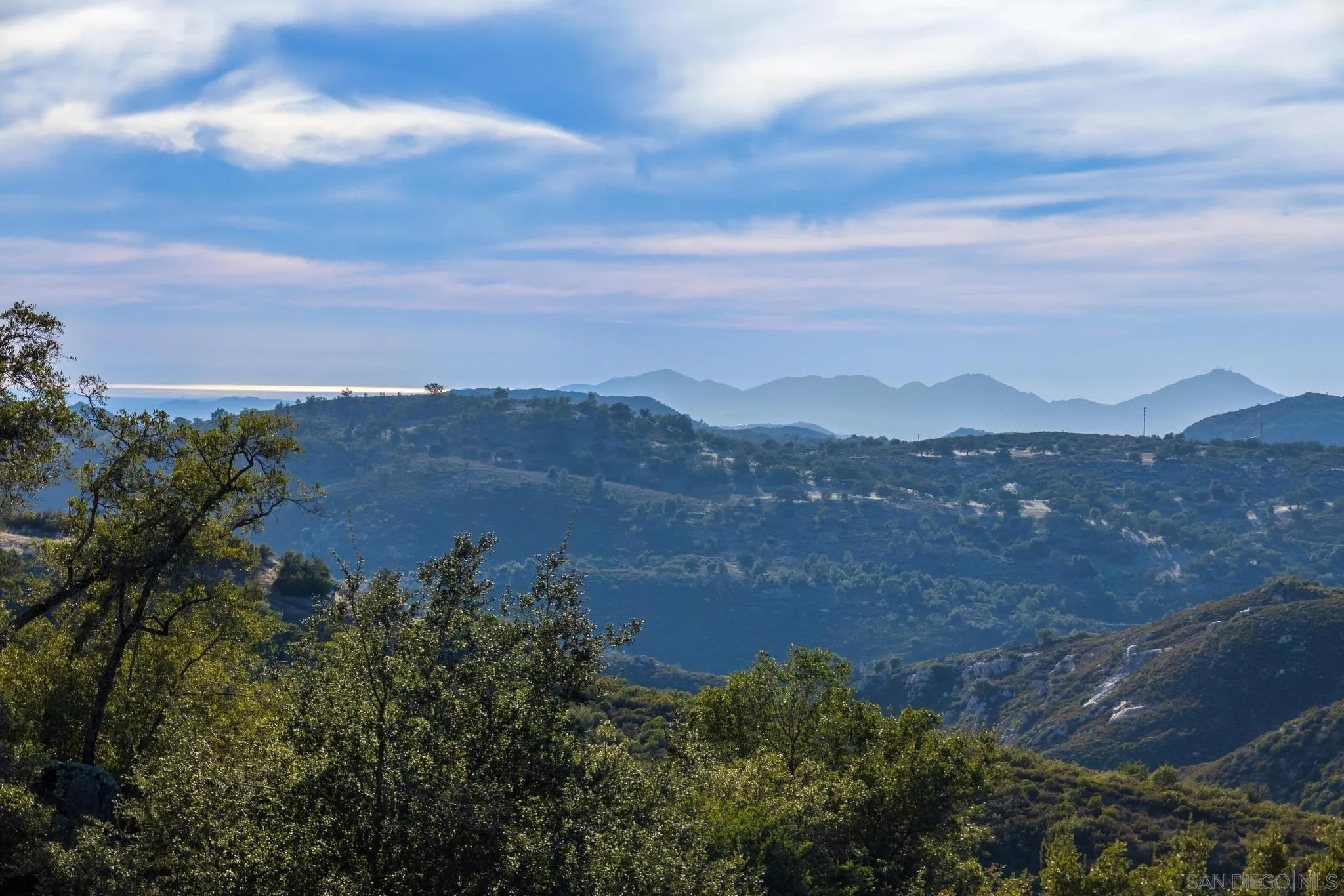 1634 Oakforest Road Santa Ysabel, CA 92070 - Photo 45 of 61 a view of a city with mountains in the background