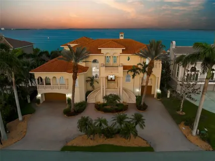 a view of swimming pool with outdoor seating