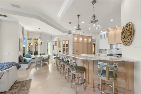 a bedroom with a bed couch and window