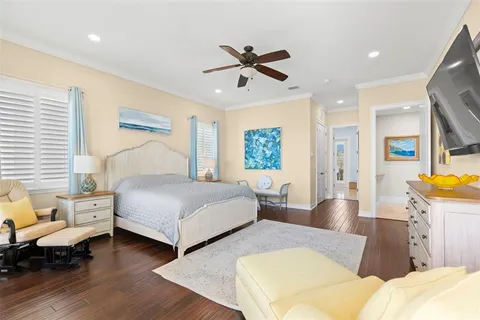 an aerial view of a house with outdoor space pool seating area
