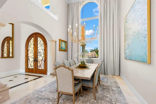 a large kitchen with a table and chairs