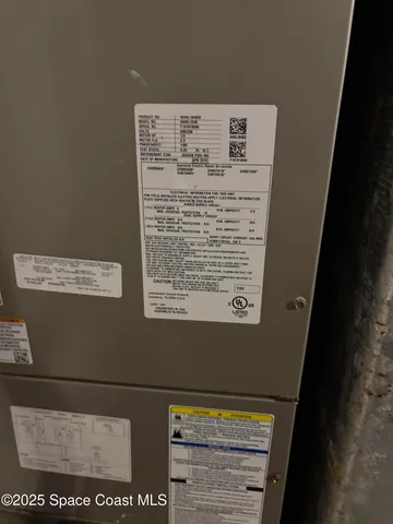 a front view of a house with a garden and plants