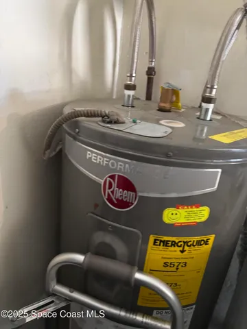a kitchen with a stove a sink and a refrigerator