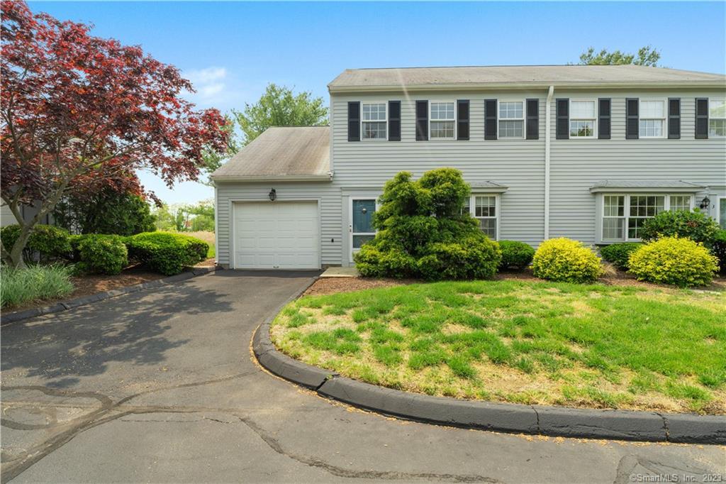 a house view with a garden space
