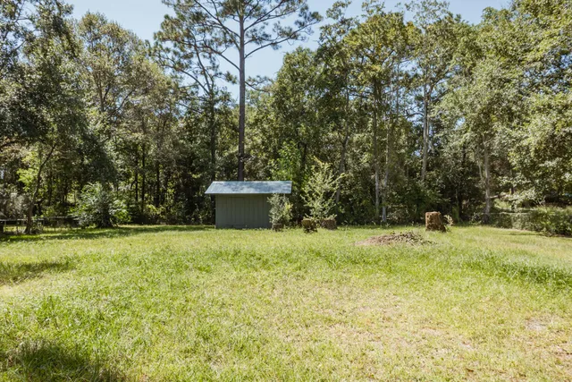 a fire hydrant in the middle of a field