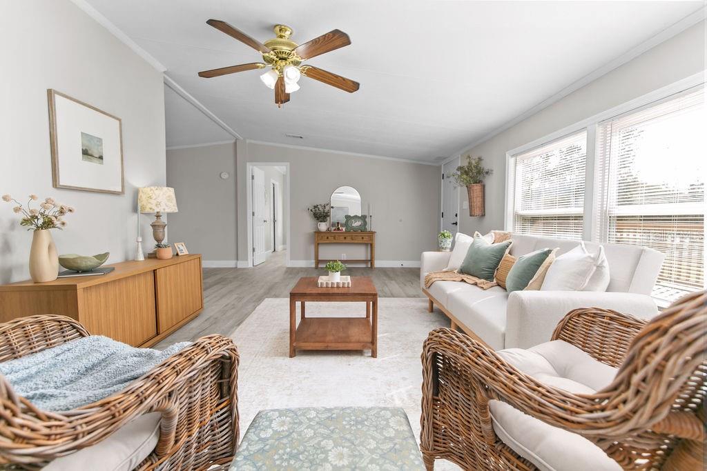 18137 Hollister Road Orlando, FL 32820 - Photo 6 of 27 a living room with furniture