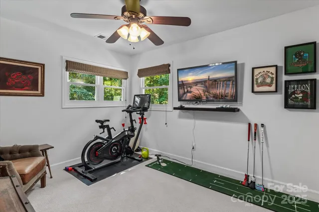 a view of a room with gym equipment