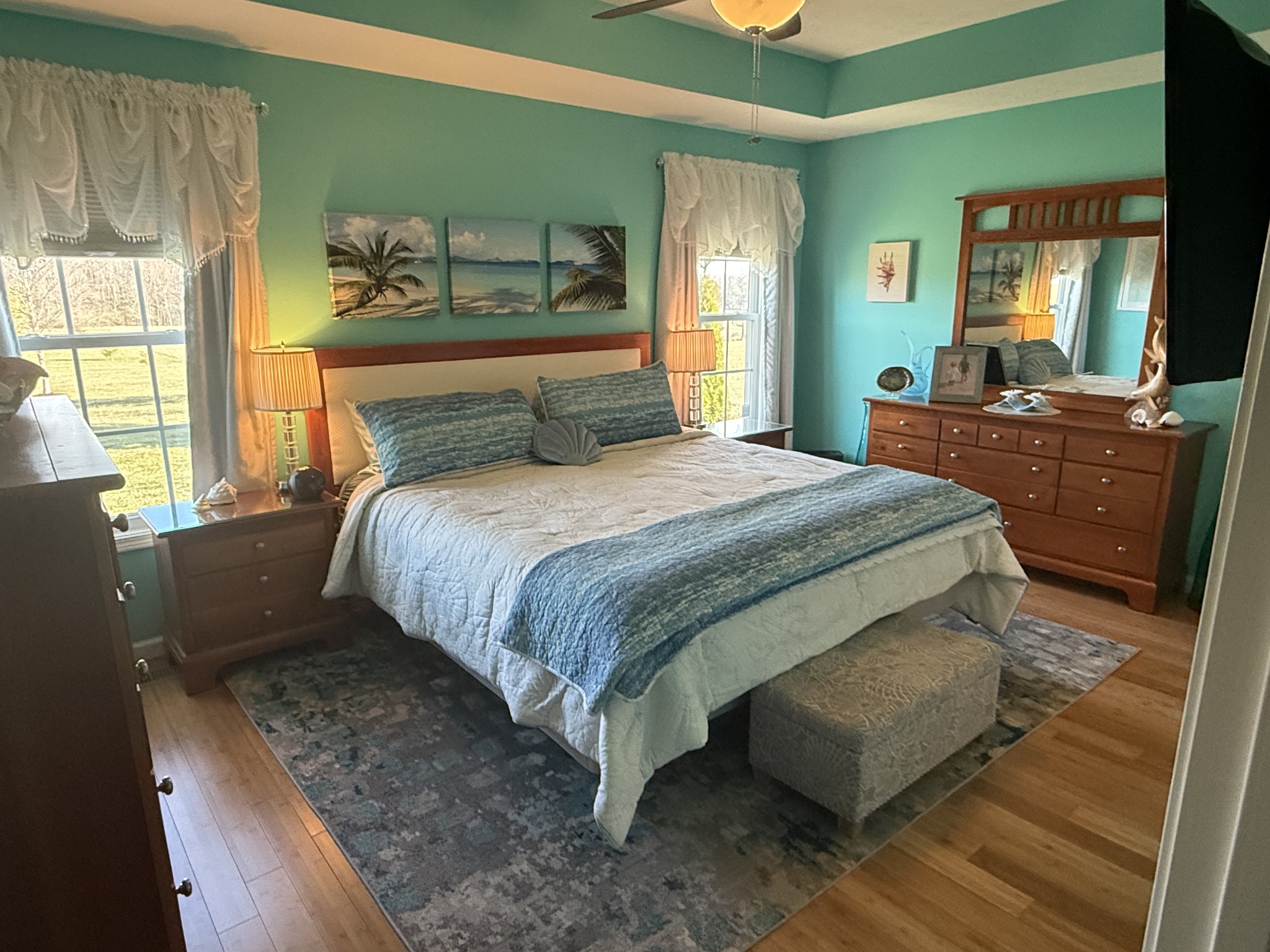 330 North Centerpoint Road Portland, TN 37148 - Photo 2 of 28 a bedroom with a bed and wooden floor