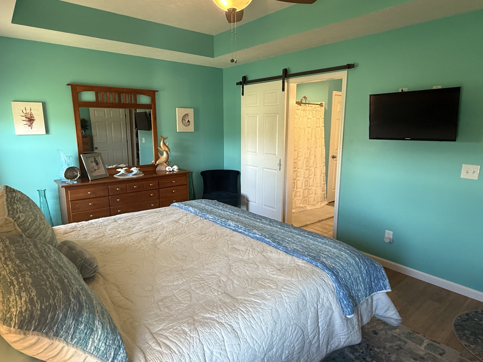 330 North Centerpoint Road Portland, TN 37148 - Photo 3 of 28 a bedroom with a bed and a flat screen tv