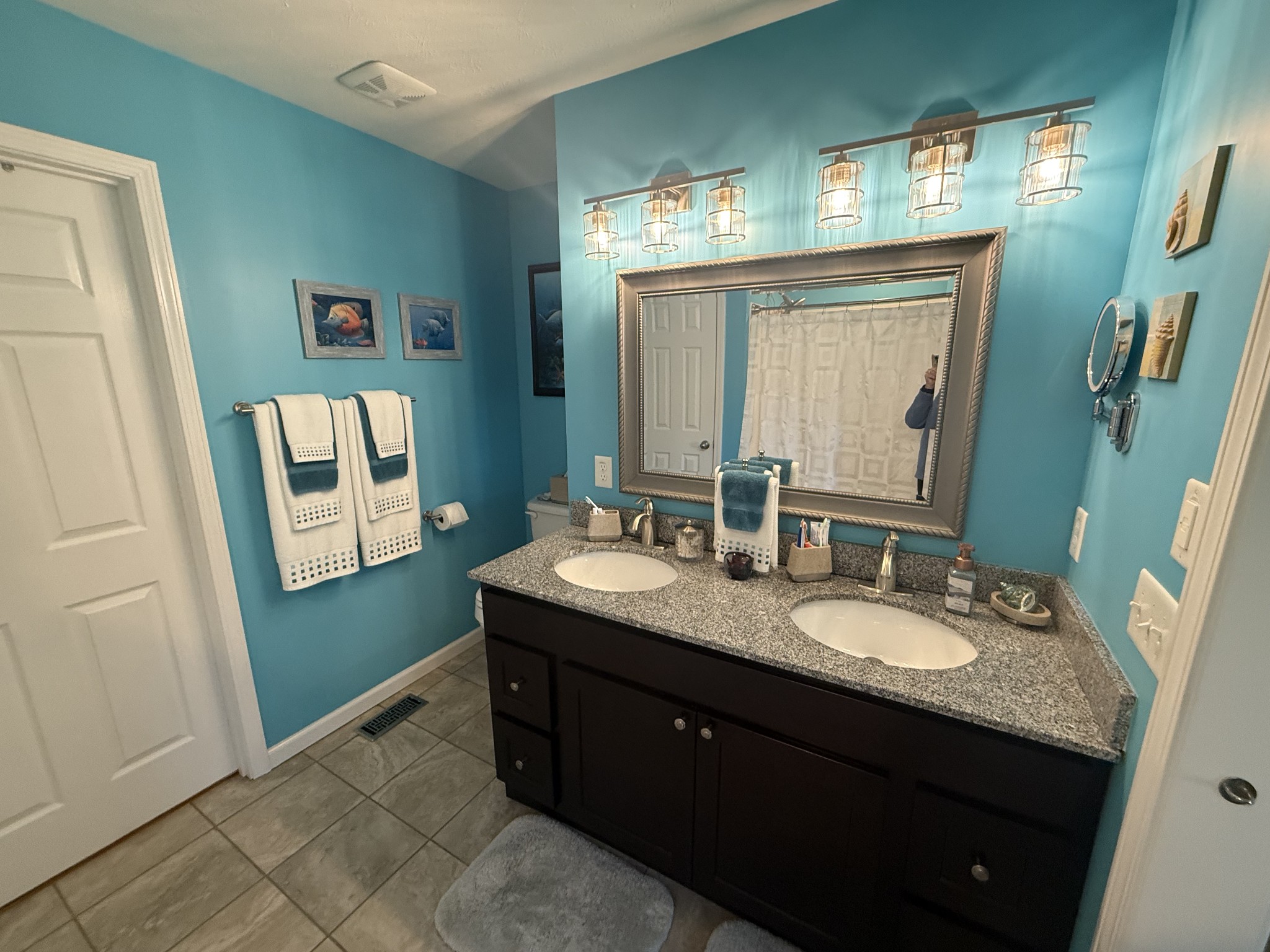 330 North Centerpoint Road Portland, TN 37148 - Photo 4 of 28 a bathroom with a granite countertop sink vanity and mirror