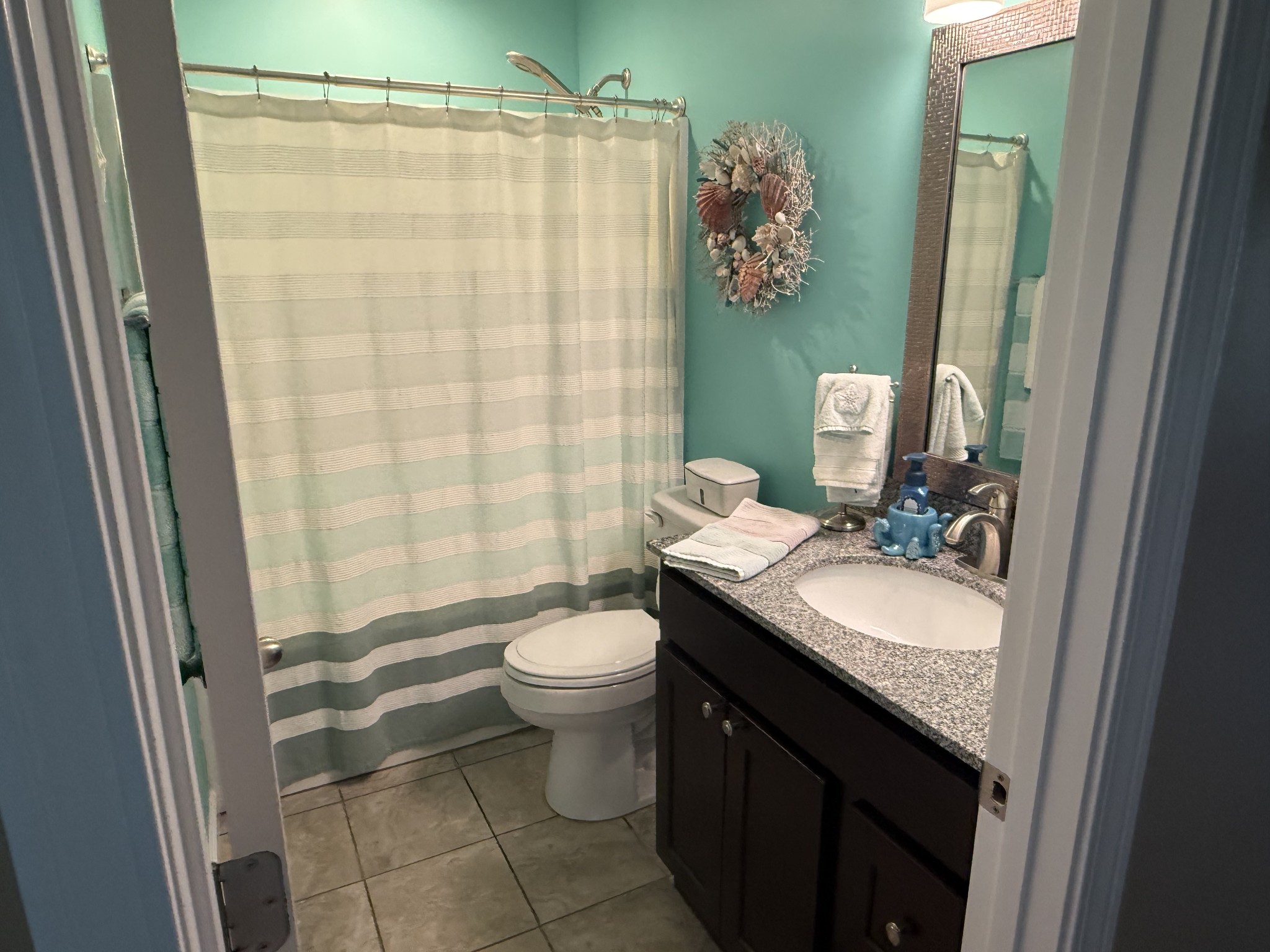 330 North Centerpoint Road Portland, TN 37148 - Photo 7 of 28 a bathroom with a granite countertop sink toilet and shower