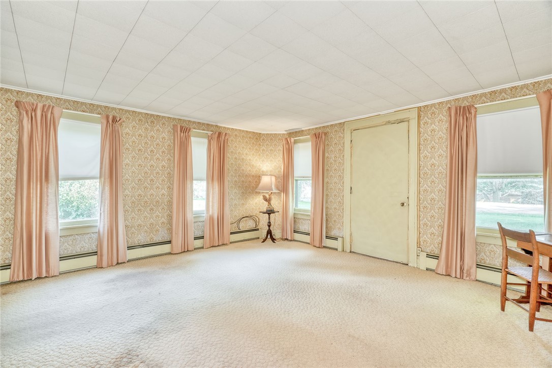 1178 Ridge Road Ontario, NY 14519 - Photo 15 of 49 Family Room with entry from the very front of the house.