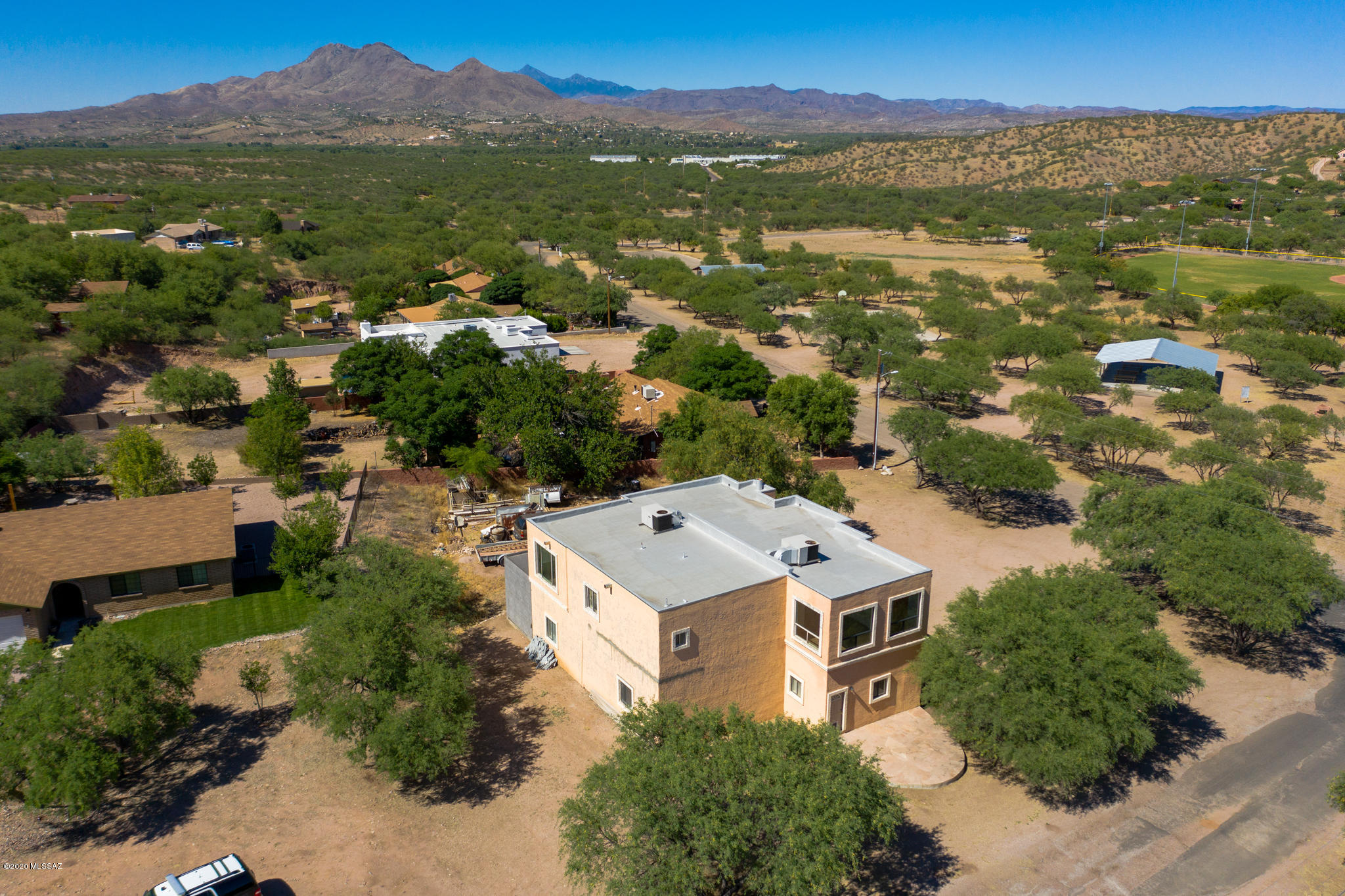 964 Calle Robalo Rio Rico, AZ 85648 - Photo 32 of 35 an aerial view of a house with a lake view