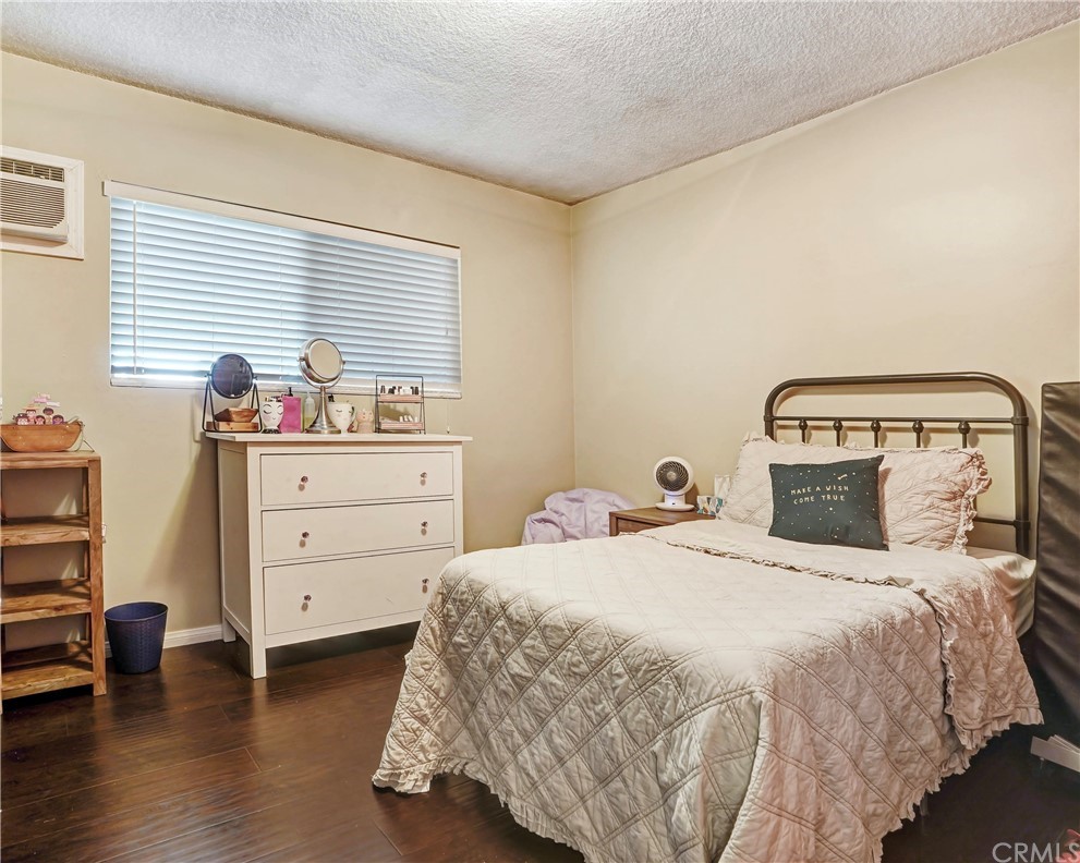 10223 25th Street Rancho Cucamonga, CA 91730 - Photo 15 of 17 a bedroom with a bed and a closet