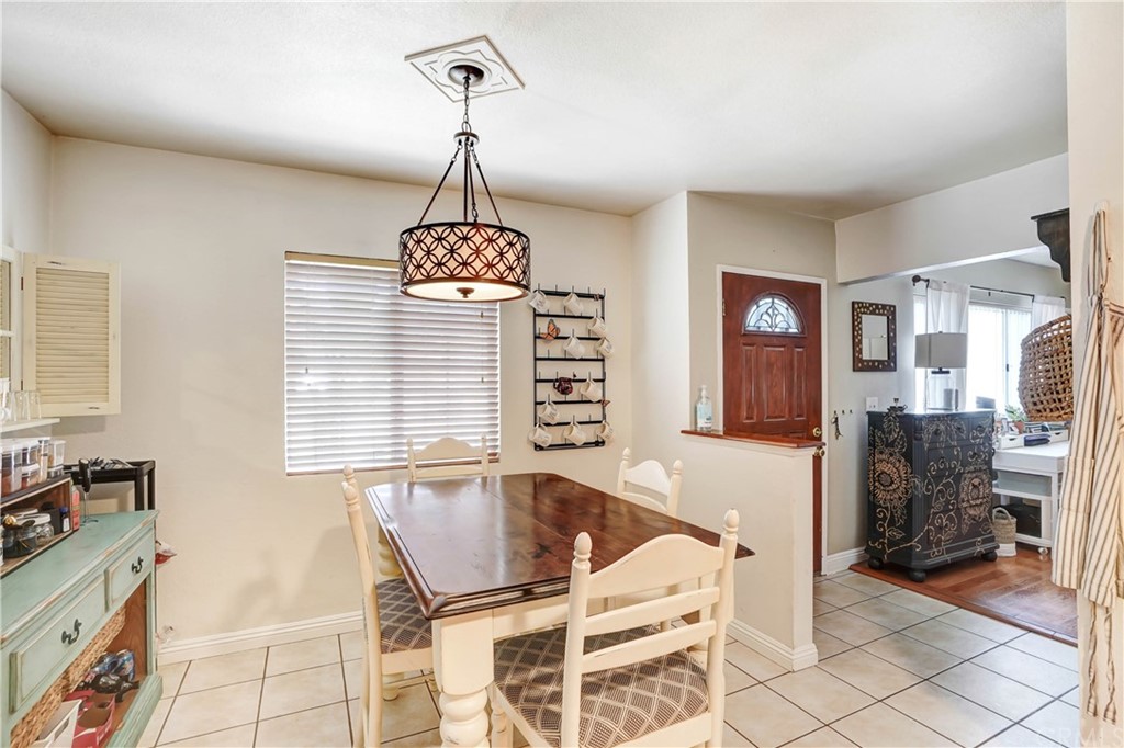 10223 25th Street Rancho Cucamonga, CA 91730 - Photo 7 of 17 a dining room with furniture and window