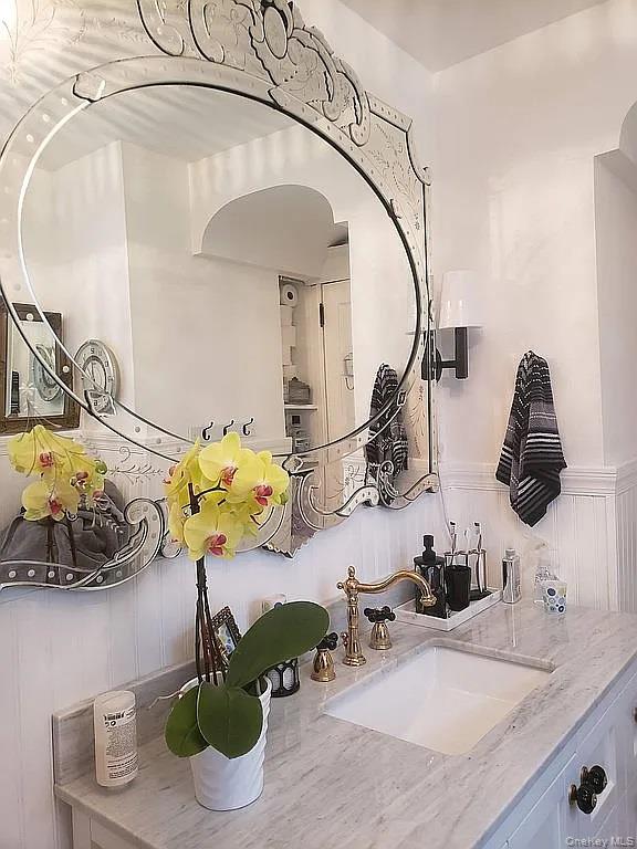 421 Spring Street Monroe, NY 10950 - Photo 40 of 49 a bathroom with a sink mirror and vanity