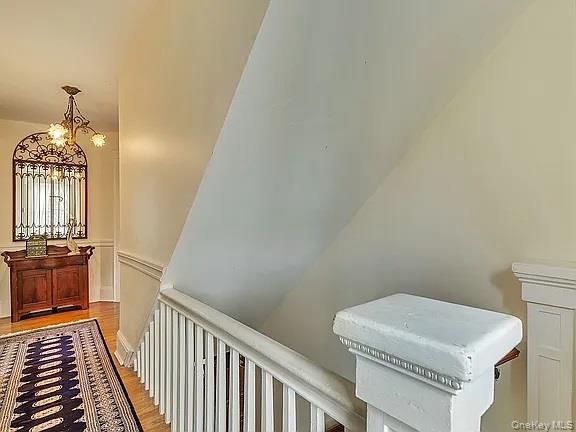 421 Spring Street Monroe, NY 10950 - Photo 43 of 49 a view of a hallway to bedroom with wooden floor