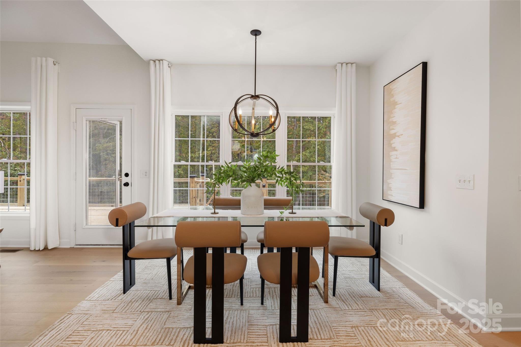 15906 Youngblood Road Charlotte, NC 28278 - Photo 12 of 41 a view of a dining room with furniture window and outside view