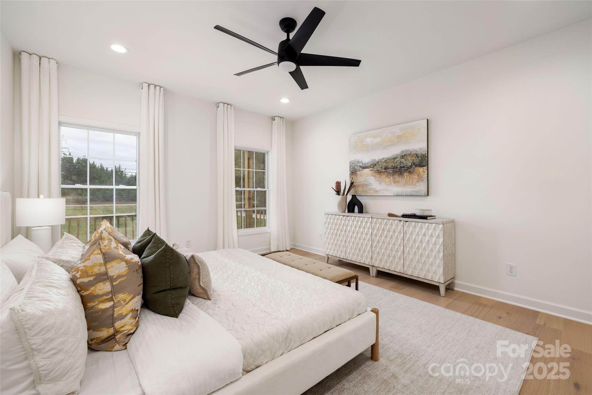 15906 Youngblood Road Charlotte, NC 28278 - Photo 14 of 41 a bedroom with a bed and a window
