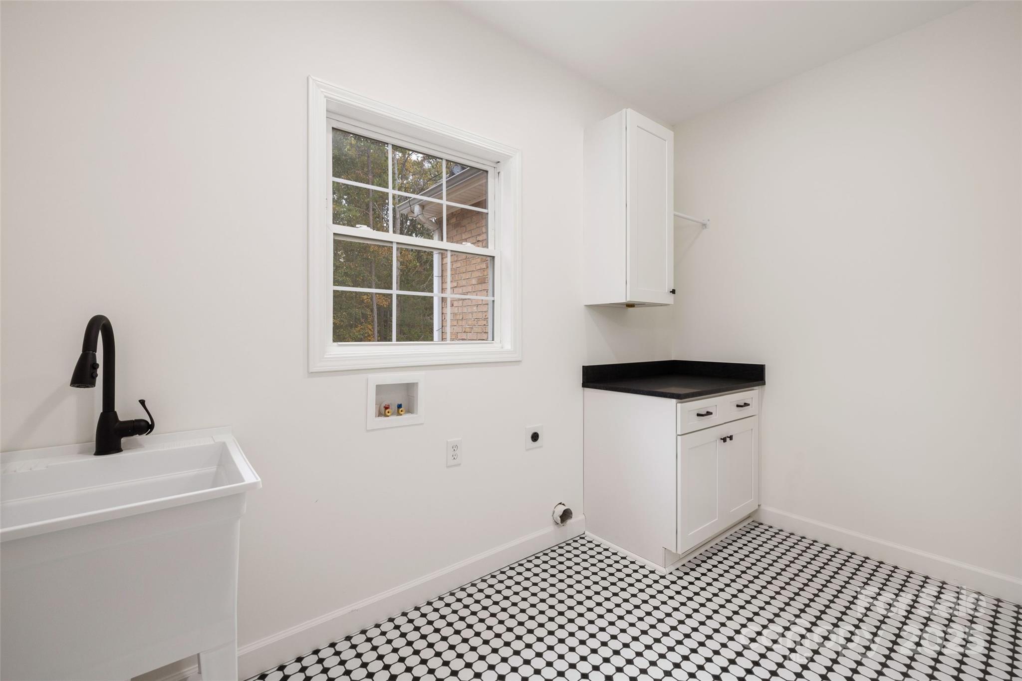 15906 Youngblood Road Charlotte, NC 28278 - Photo 17 of 41 a view of a sink and a window in a room