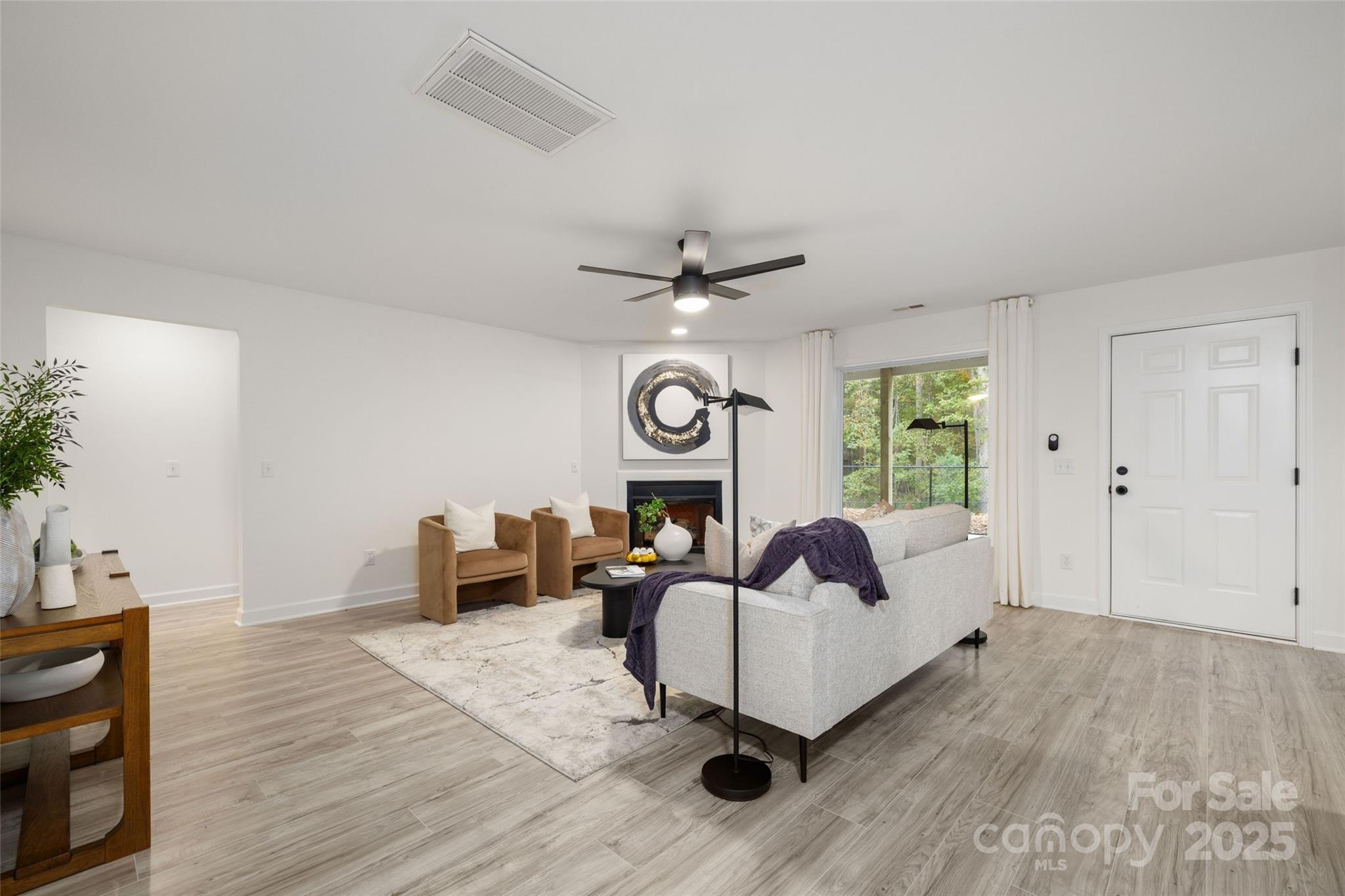 15906 Youngblood Road Charlotte, NC 28278 - Photo 25 of 41 a living room with furniture and a window