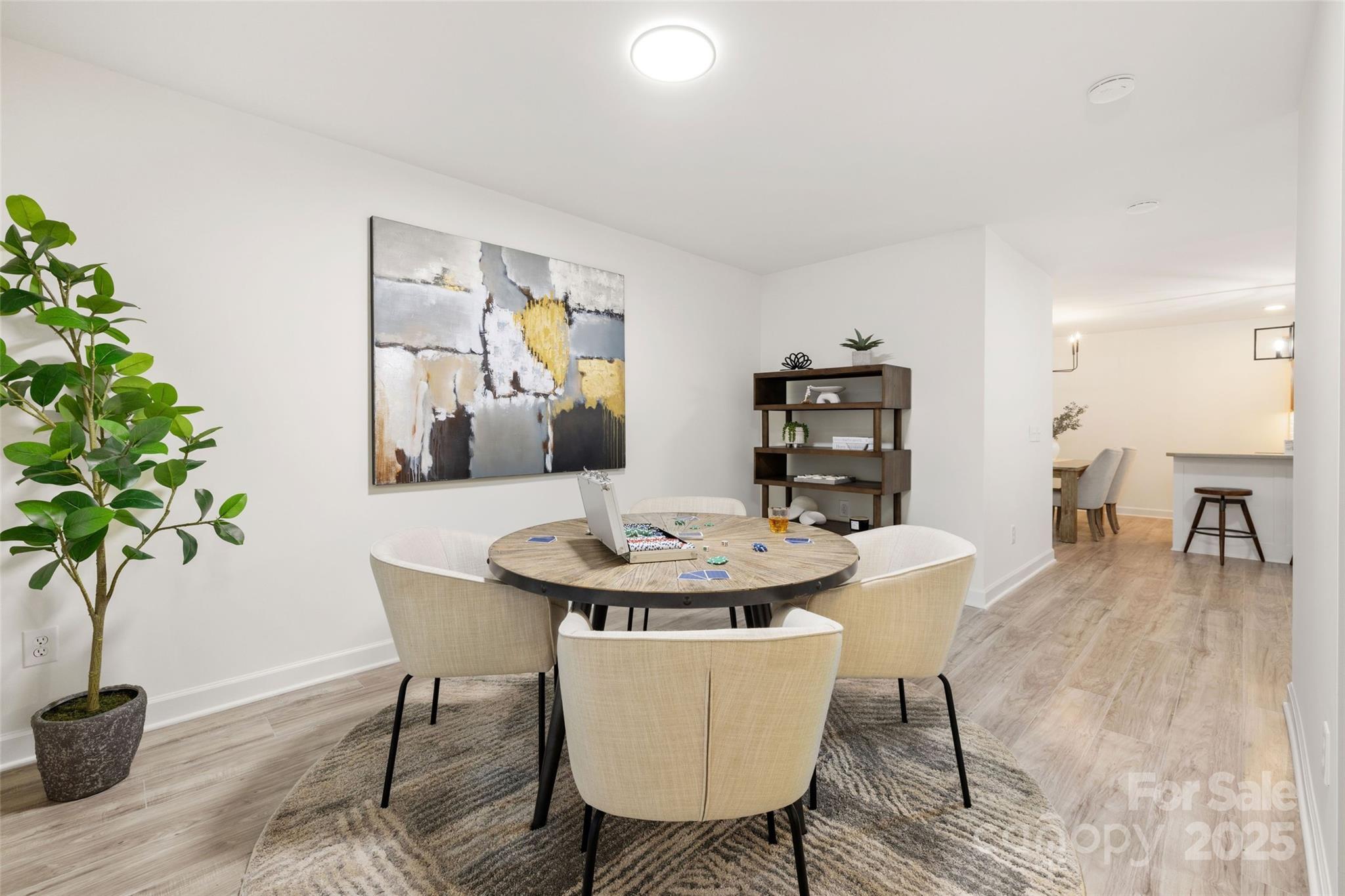 15906 Youngblood Road Charlotte, NC 28278 - Photo 26 of 41 a view of a dining room with furniture and wooden floor