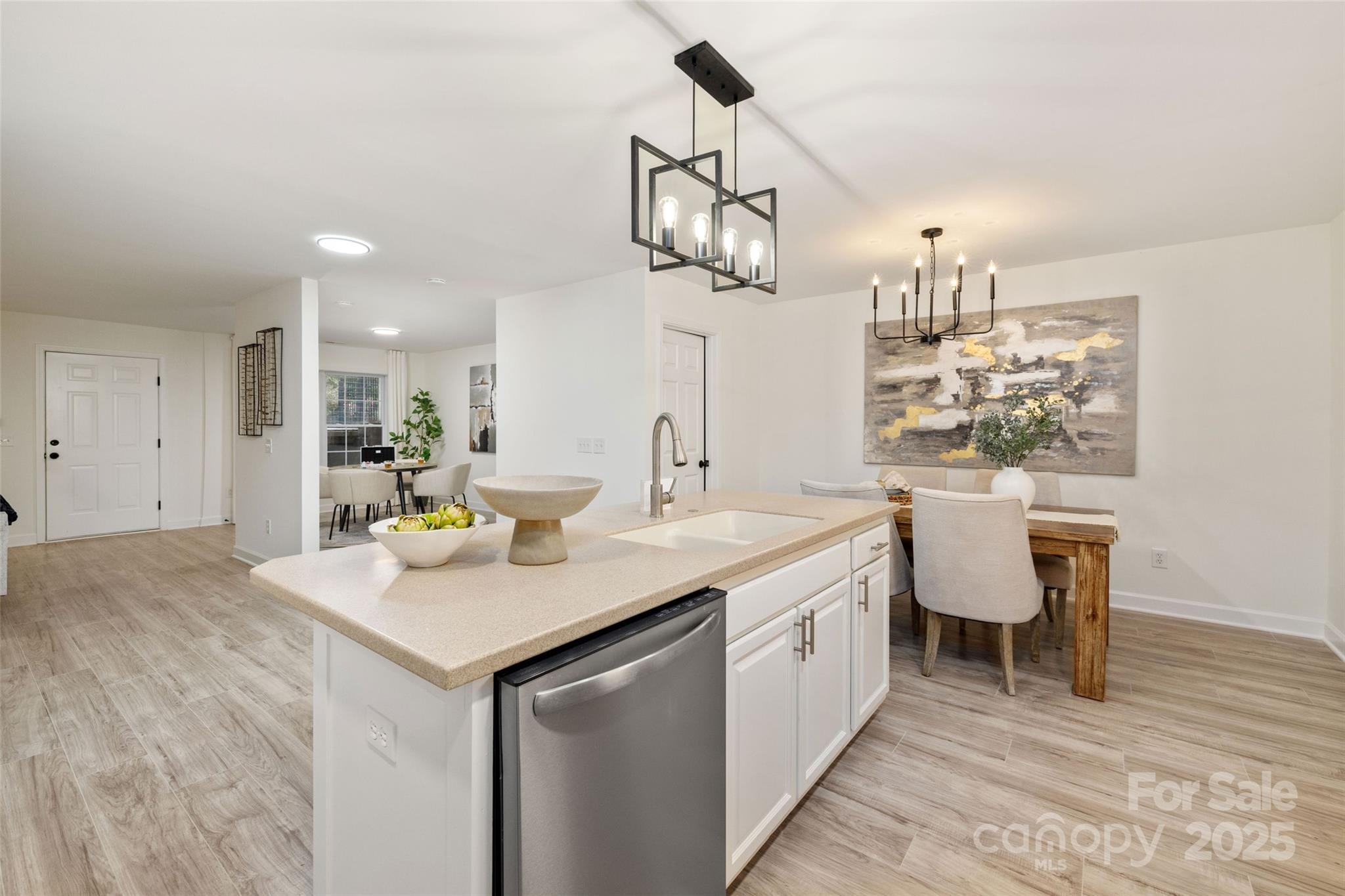 15906 Youngblood Road Charlotte, NC 28278 - Photo 29 of 41 a kitchen with a sink cabinets and wooden floor