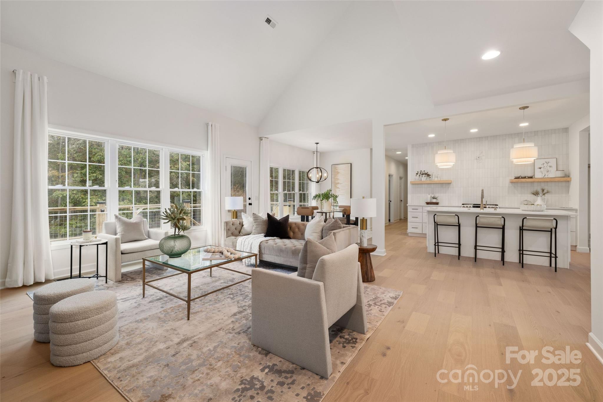15906 Youngblood Road Charlotte, NC 28278 - Photo 6 of 41 a living room with furniture and a large window