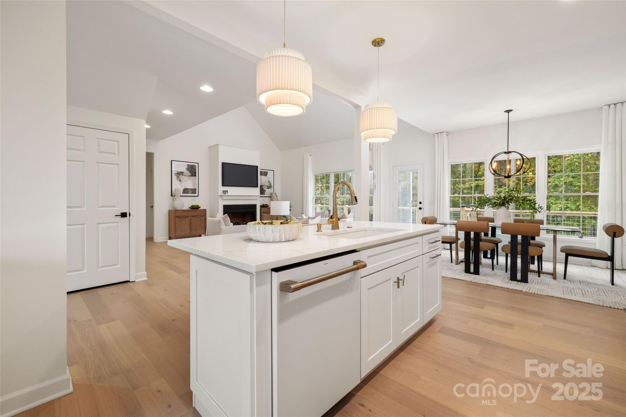 15906 Youngblood Road Charlotte, NC 28278 - Photo 8 of 41 a large kitchen with a lot of counter space and a wooden floor
