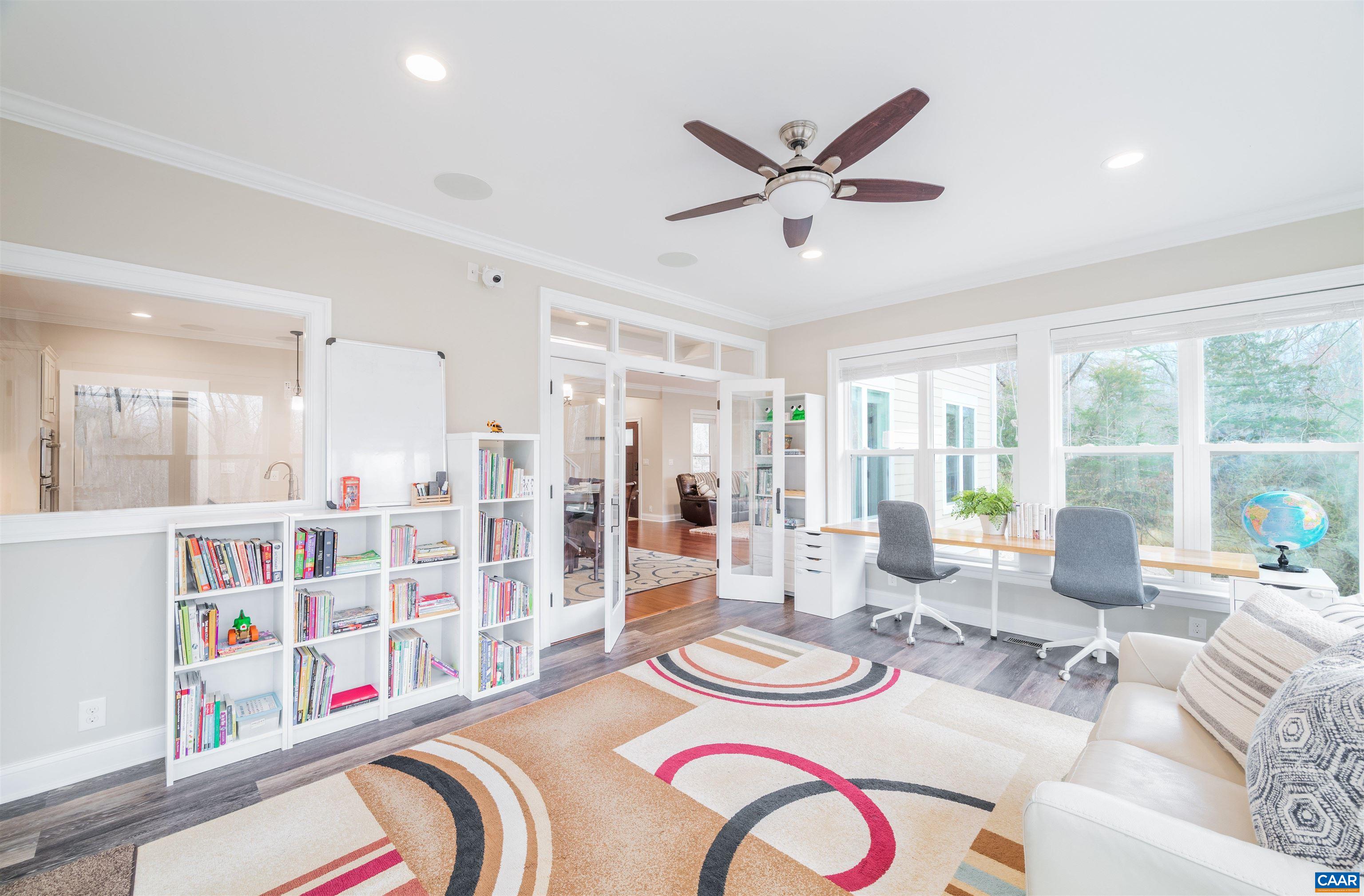 303 Turkey Ridge Road Charlottesville, VA 22903 - Photo 9 of 49 a dining room with furniture and a large window
