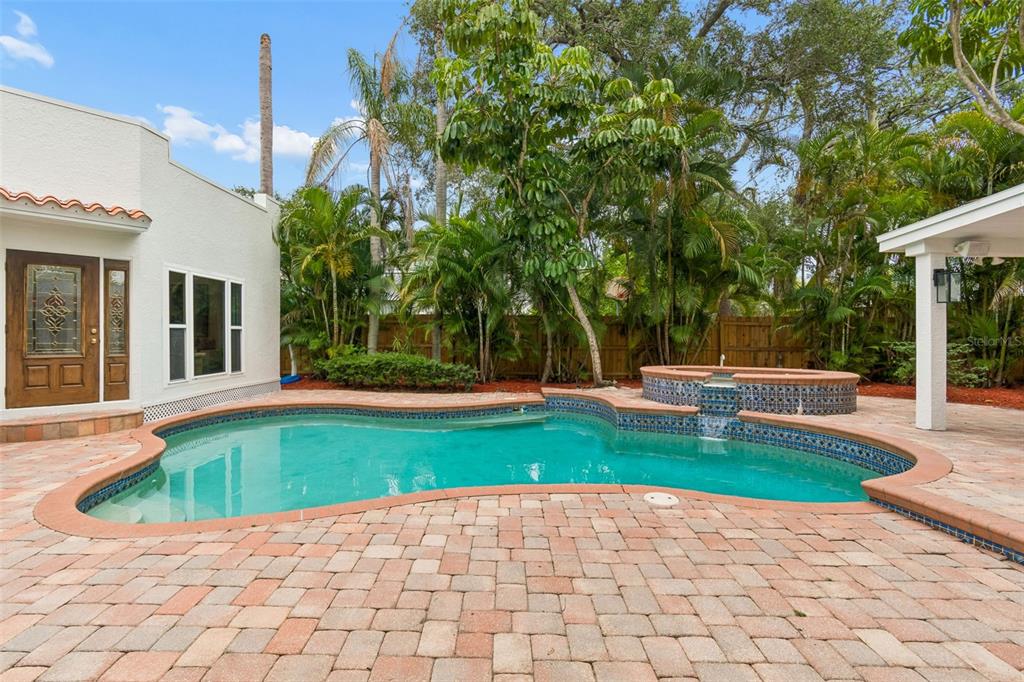 2434 West Prospect Road Tampa, FL 33629 - Photo 30 of 45 a house view with a outdoor space sitting space
