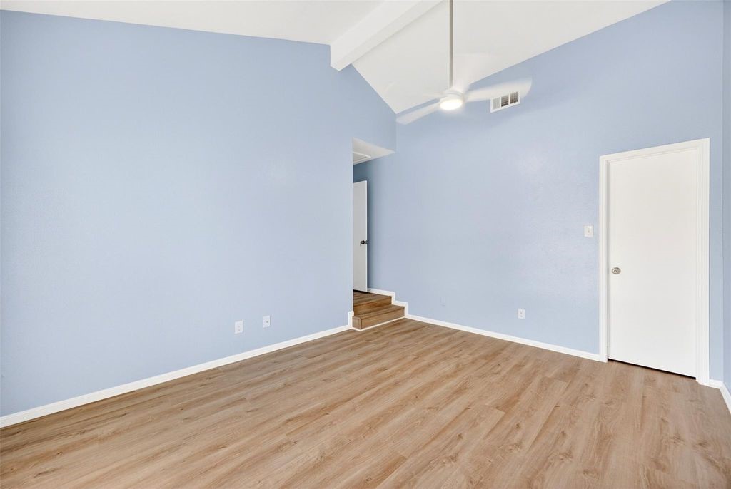 17 April Point Drive North Conroe, TX 77356 - Photo 30 of 42 a view of a room with wooden floor