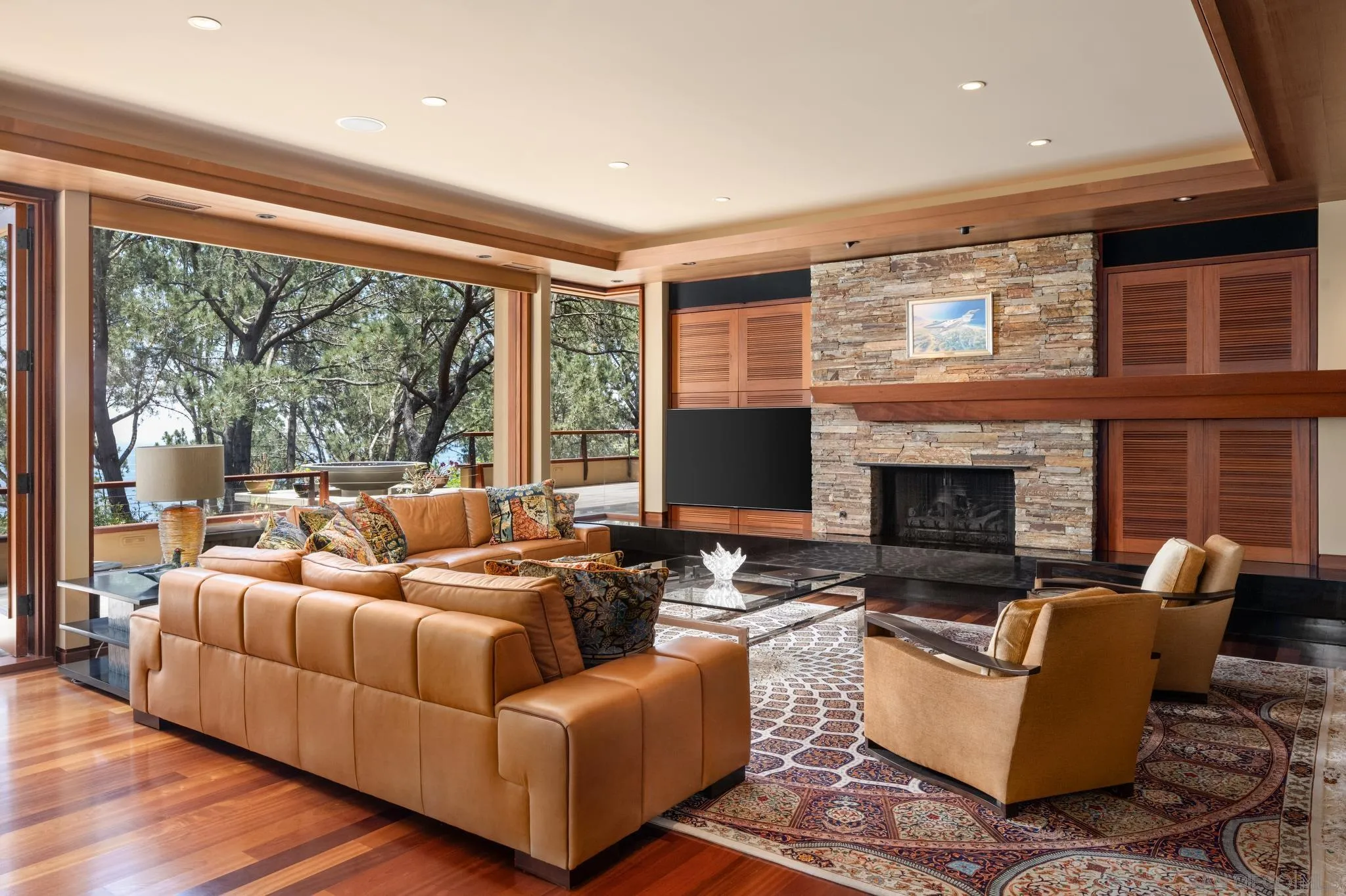 456 Hidden Pines Lane Del Mar, CA 92014 - Photo 17 of 55 a living room with furniture fireplace and a large window