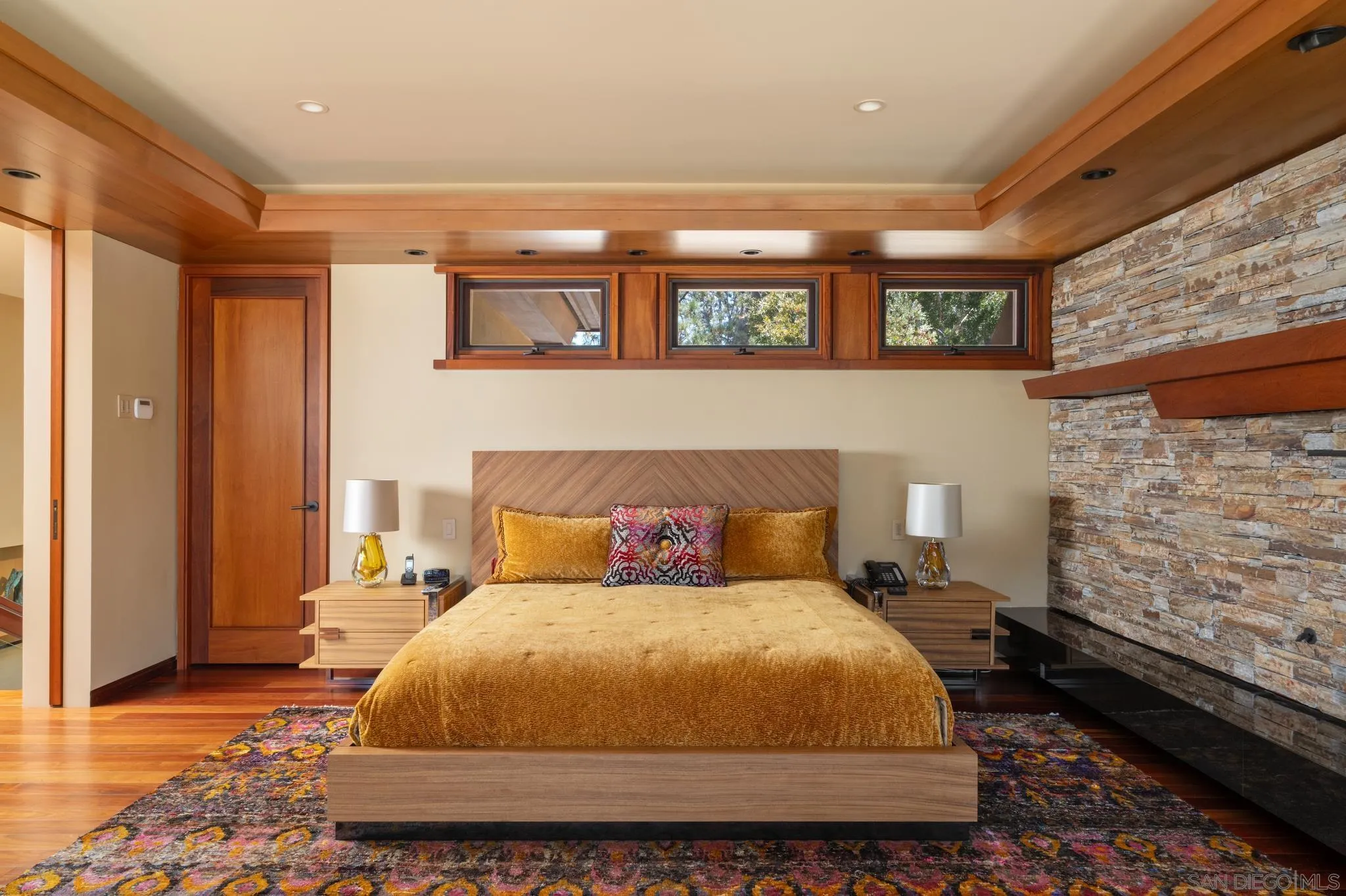 456 Hidden Pines Lane Del Mar, CA 92014 - Photo 21 of 55 a bedroom with a bed and a night stand