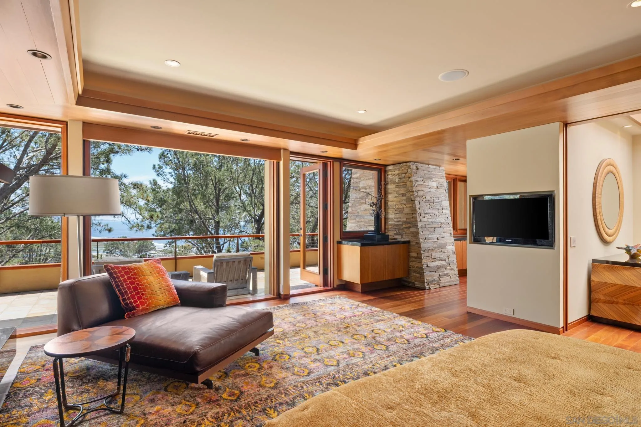 456 Hidden Pines Lane Del Mar, CA 92014 - Photo 22 of 55 a living room with furniture and a flat screen tv