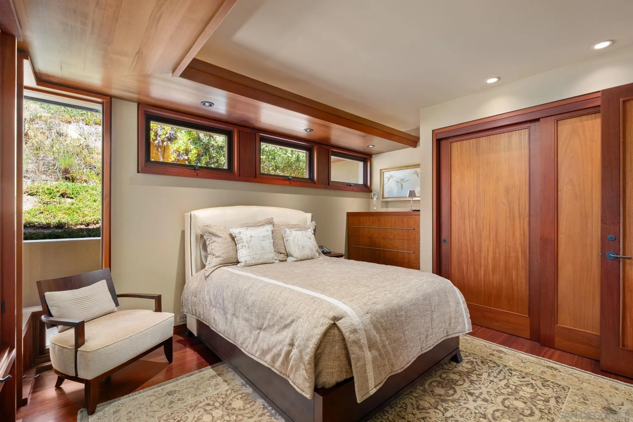 456 Hidden Pines Lane Del Mar, CA 92014 - Photo 29 of 55 a bedroom with a bed and a window