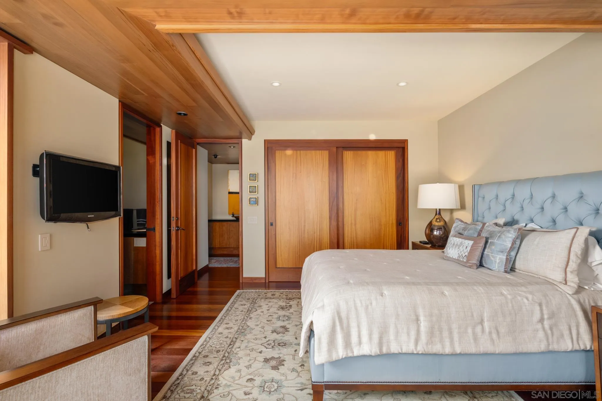 456 Hidden Pines Lane Del Mar, CA 92014 - Photo 33 of 55 a bedroom with a bed and a flat screen tv